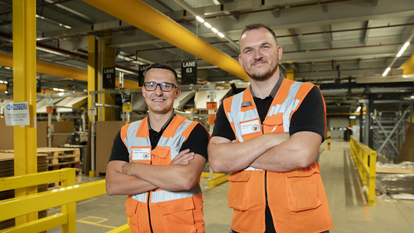 Military veterans Phil Davenport and Joe Haggis in an Amazon fulfilment centre