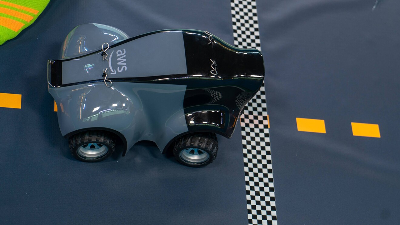 AWS DeepRacer car and track, a machine learning car with adult and kids' leagues
