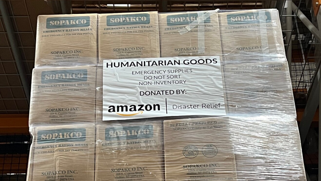 Amazon employees work together to ship disaster relief supplies to Puerto Rico.