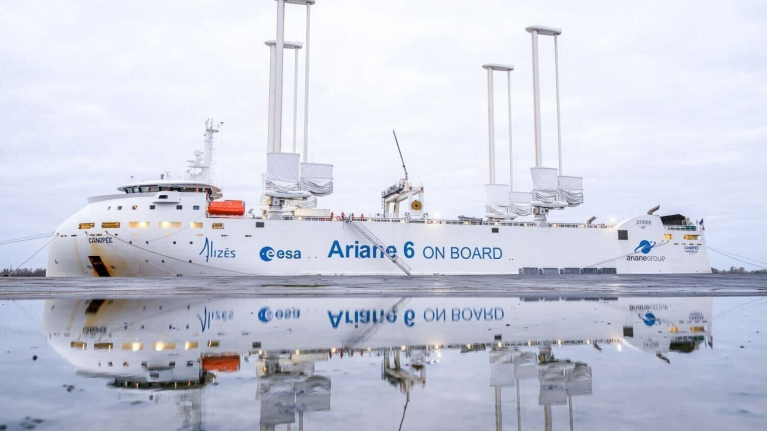 Cargo ship Canopée with Ariane 6 rocket components reflected in water
