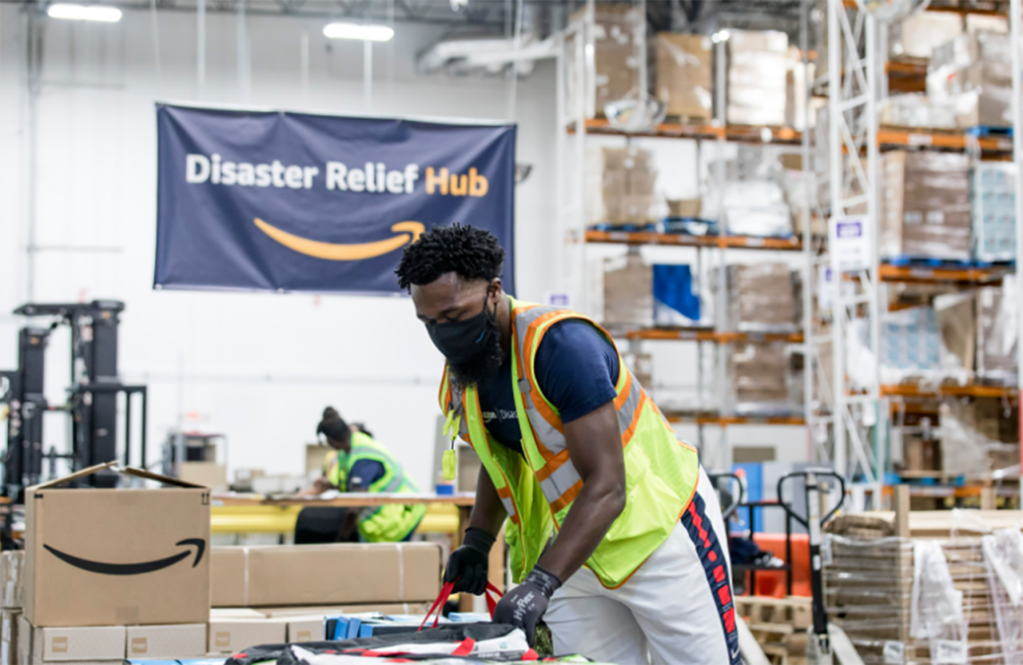 An Amazon employee prepares products for distribution at the Amazon Disaster Relief Hub in Atlanta, Georgia.