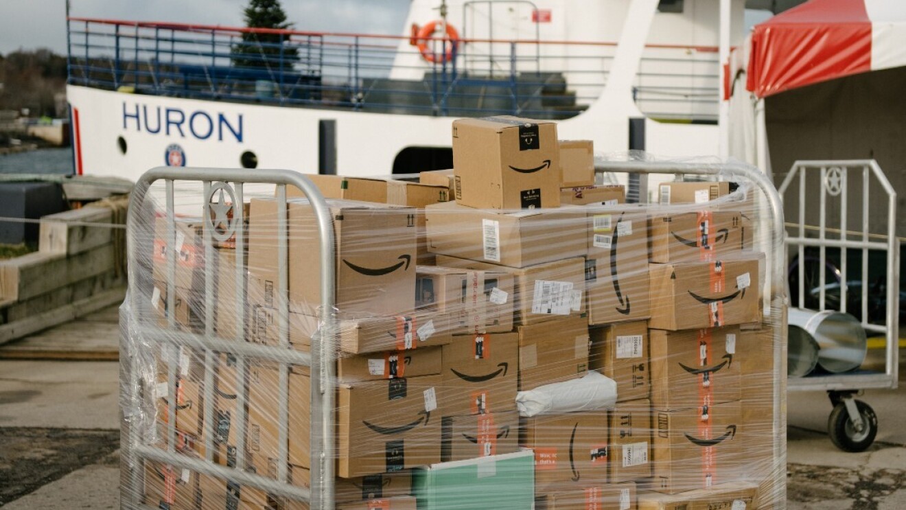 Amazon packages are ready to be loaded on to the Mackinac ferry.