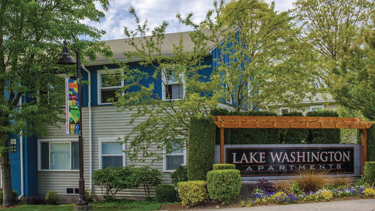 A photo of the entrance of the Lake Washington Apartments.