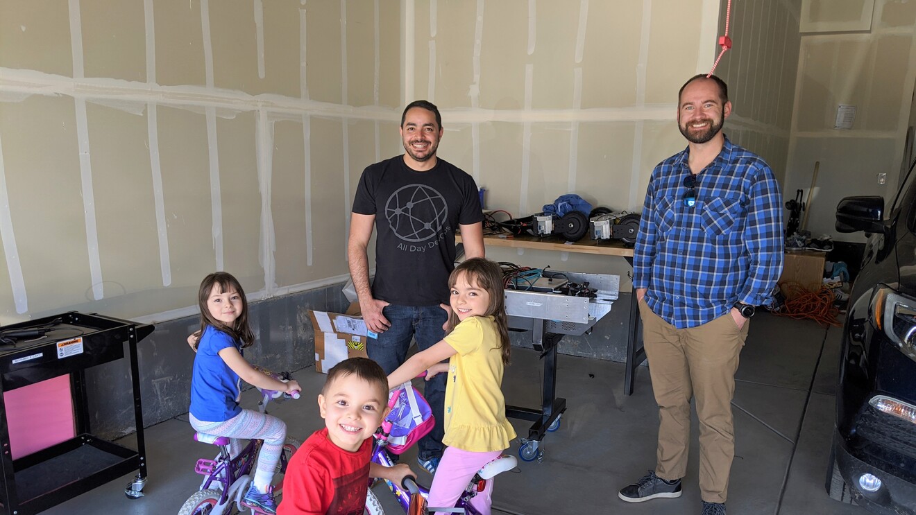 Amazon employee working on robotics advancement from his garage during the pandemic