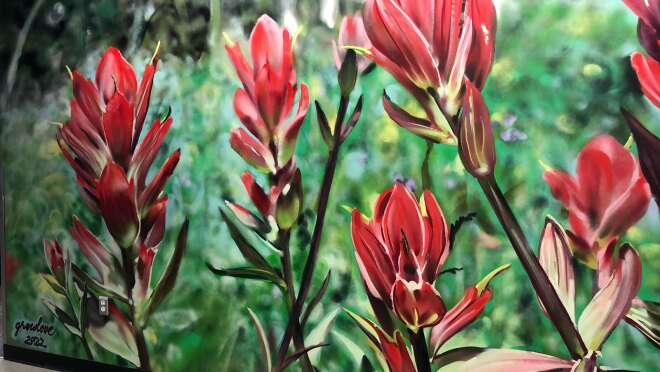 A painted mural of red flowers at the Amazon Denver office.
