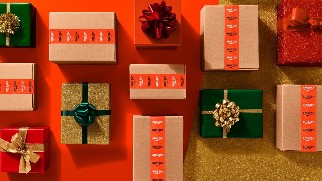 Flatlay of wrapped holiday season gifts and Amazon boxes.