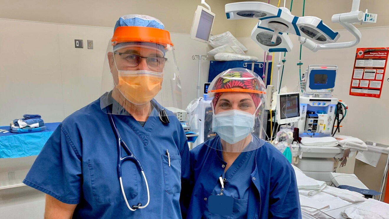 Volunteers work together to use technology to make PPE for medical professionals during the COVID-19 pandemic