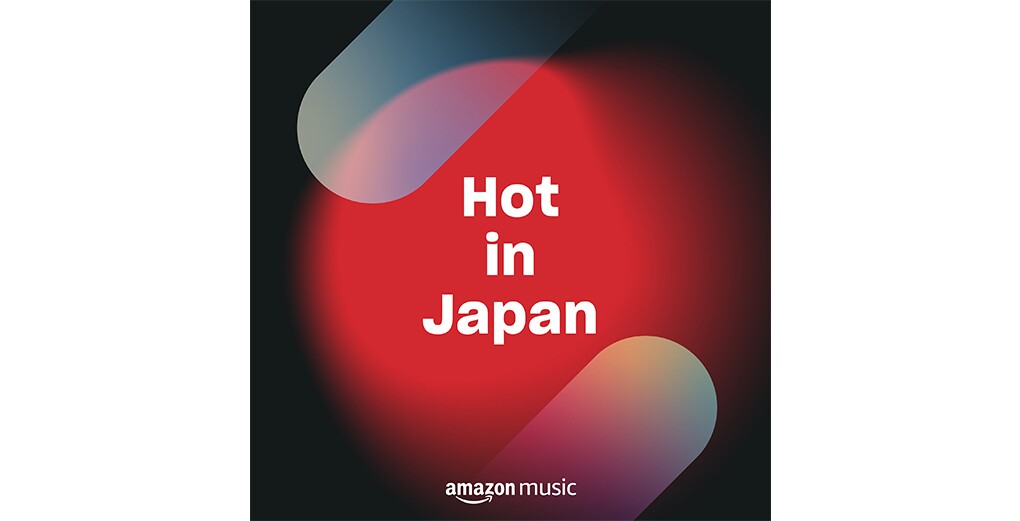 黒い背景にあるぼやけた赤い円形が真ん中に「Hot in Japan」と書かれている。