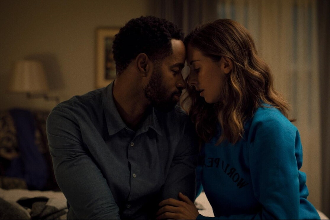 A man and a woman looking at each other lovingly