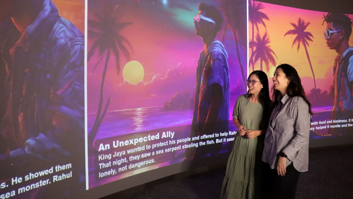 Two women experiencing StoryGen, a first-of-its-kind generative AI-enabled prototype that AWS has produced for libraries.
