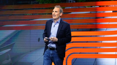 Amazon CEO Andy Jassy speaking in front of a crowd.