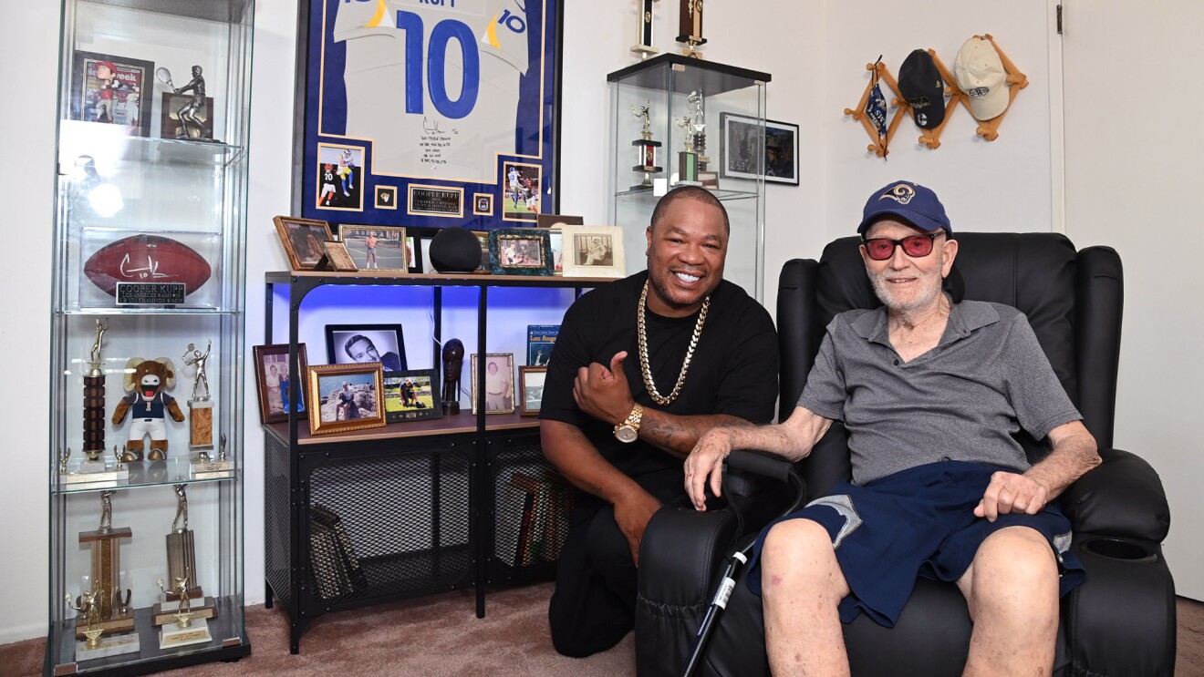 An image of Lewis Lazarus and rapper Xzibit at Lazarus' new fan cave in his Santa Monica apartment.