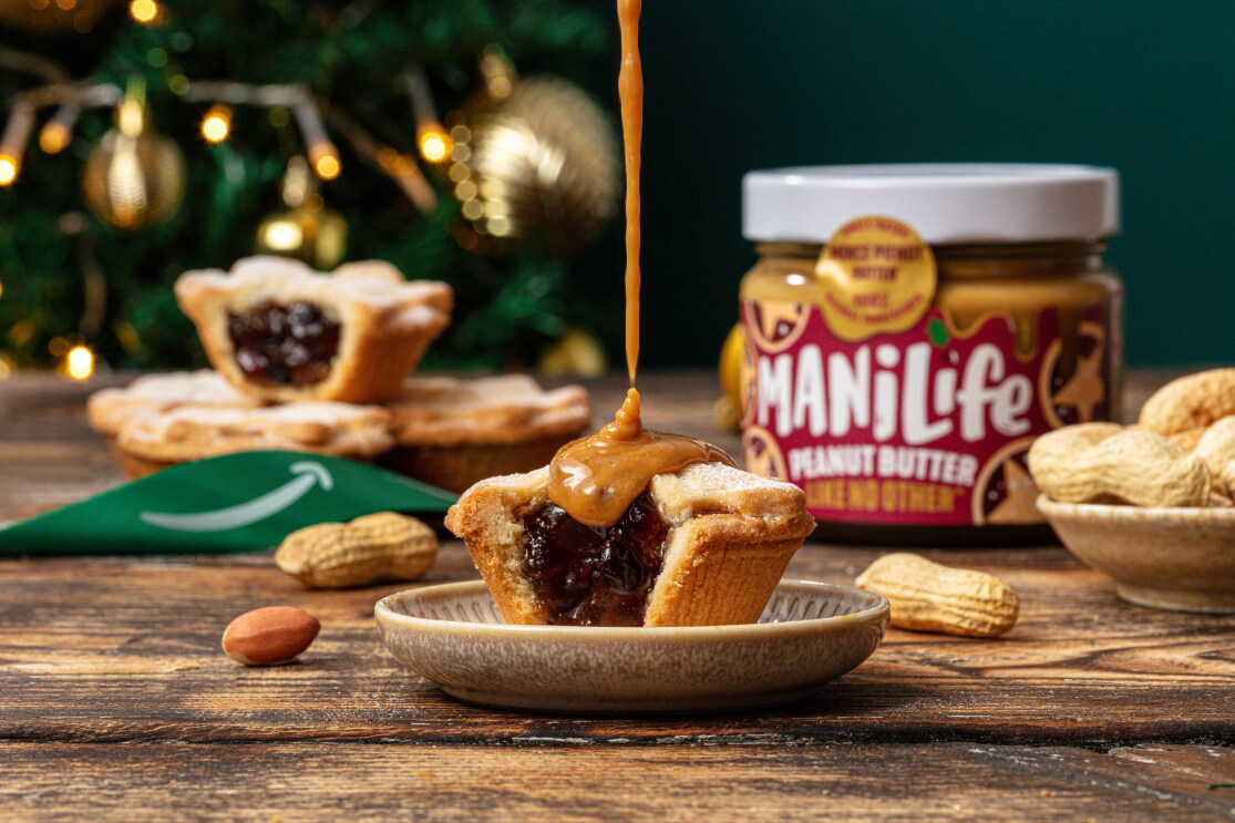 ManiLife Mince Pienut Butter being drizzled on a mince pie