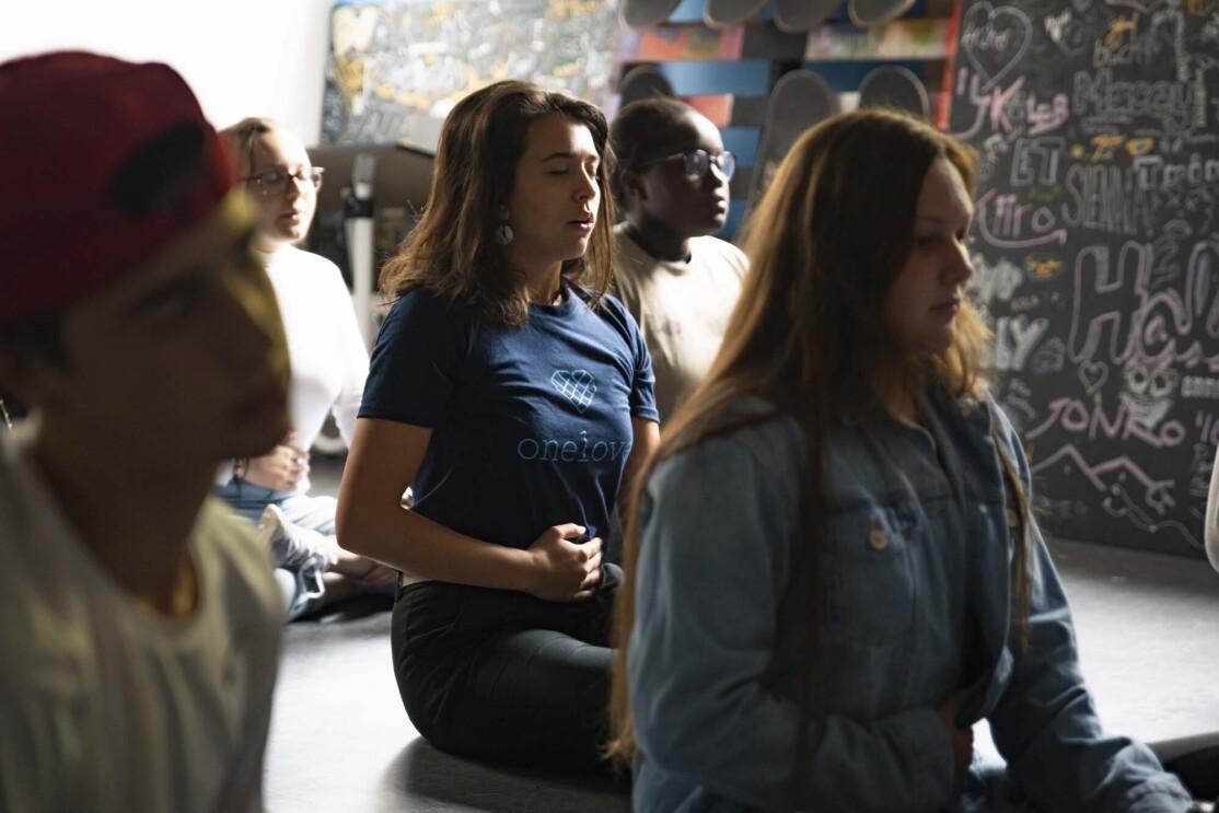 High school students practice mindful meditation while using the new Alexa skill, "Keep Calm"