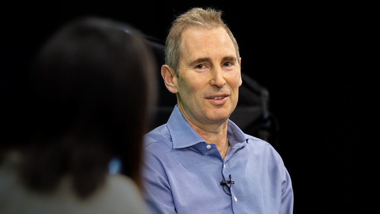 Andy Jassy, CEO of Amazon, speaks with Alicia Boler Davis as he answers employee questions at a fireside chat. 