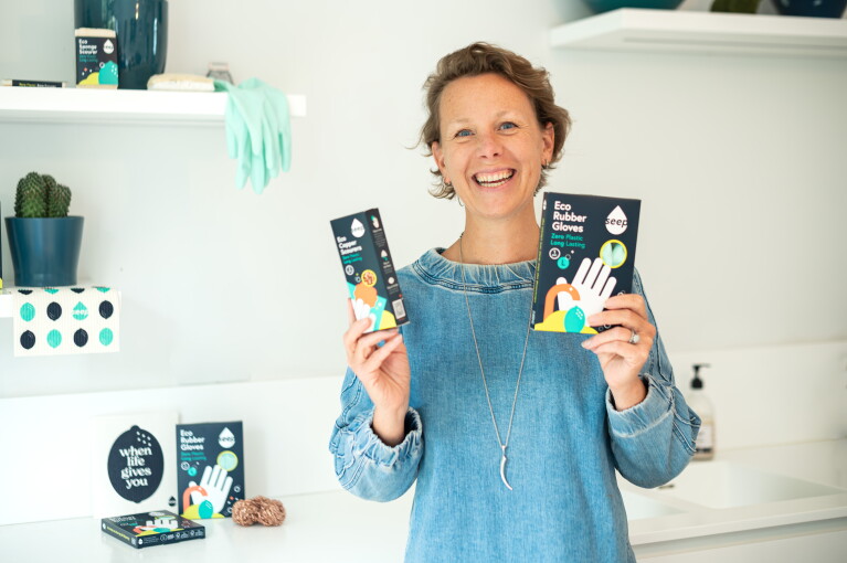 Laura with her Seep company products