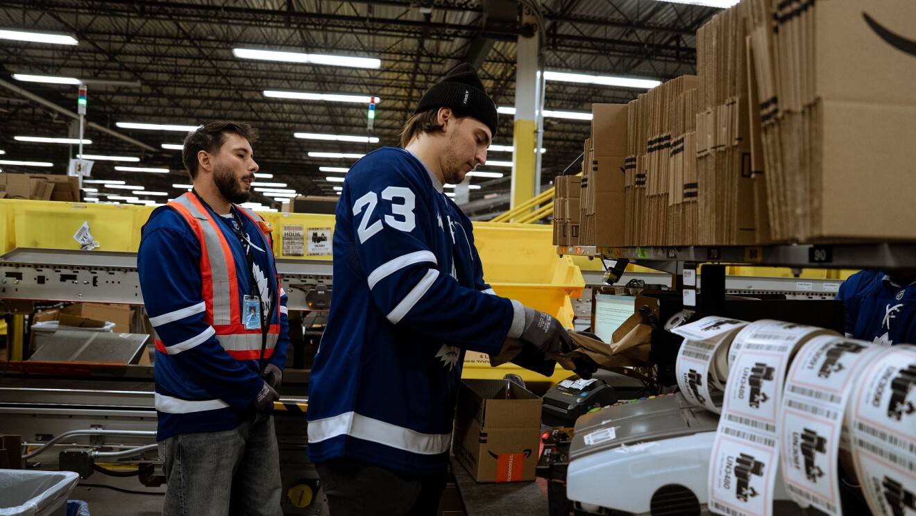 Toronto Maple Leafs hockey player packing boxes 