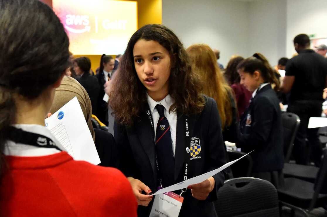 Students talking to each other at the AWS Get IT event 
