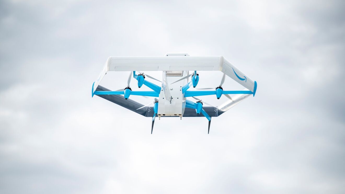 An Amazon delivery drone flying in the air