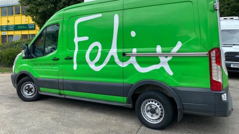 A green van with the Felix Project logo 