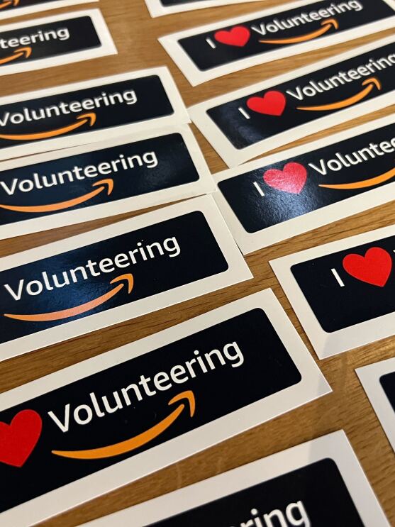 I Love Volunteering stickers at Amazon's Global Month of Volunteering