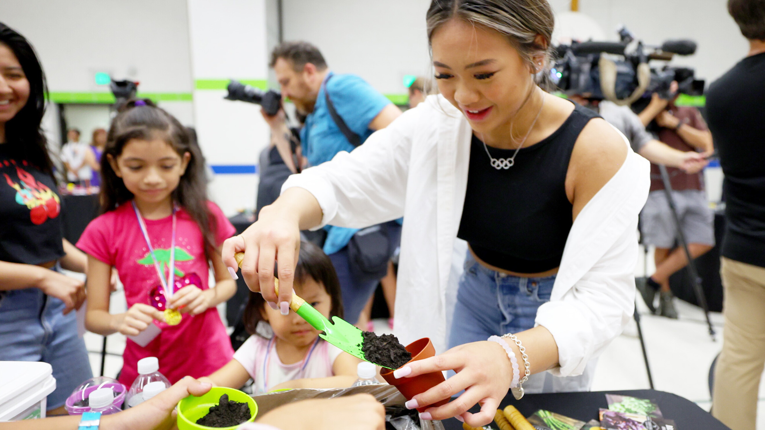 U.S. Olympic gymnast Suni Lee surprises students at Amazon's backto