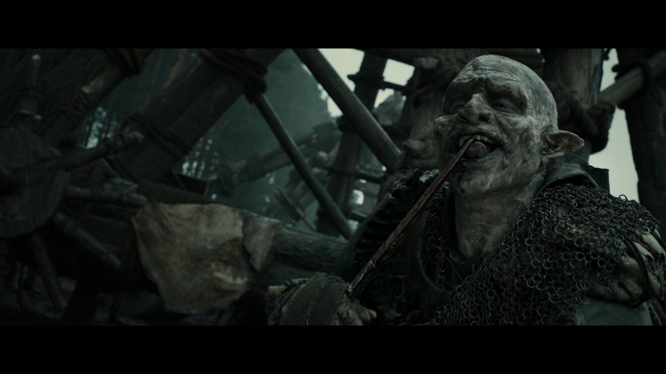 An orc holding a knife in The Lord of Rings: The Rings of Power