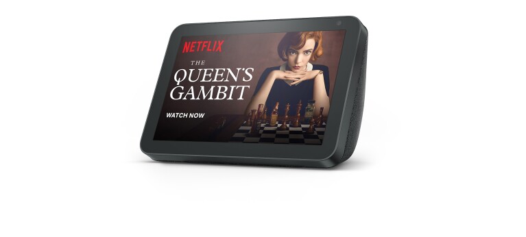 An Amazon Echo Show displaying a Netflix page for the show "The Queens Gambit"