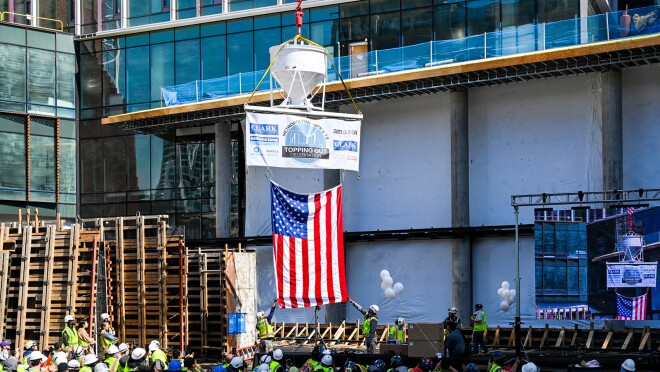 亚马逊第二总部大都会公园的“顶出”活动庆祝活动的图像。