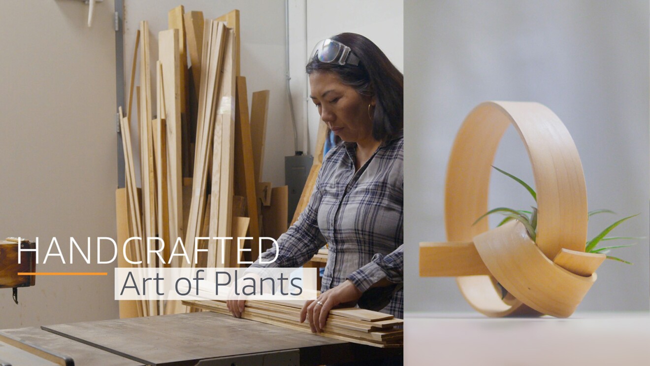 A woman works with wood in her studio