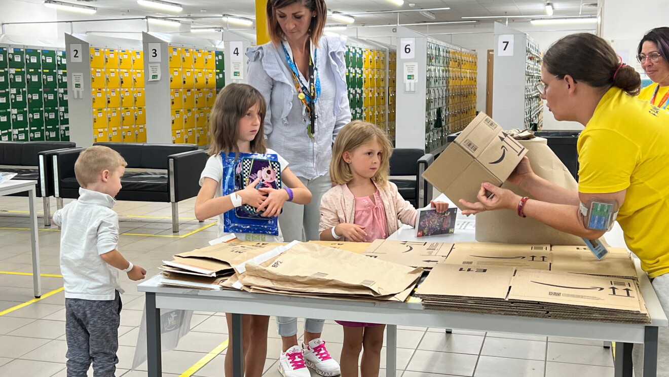 Amazon employees at FC with their children