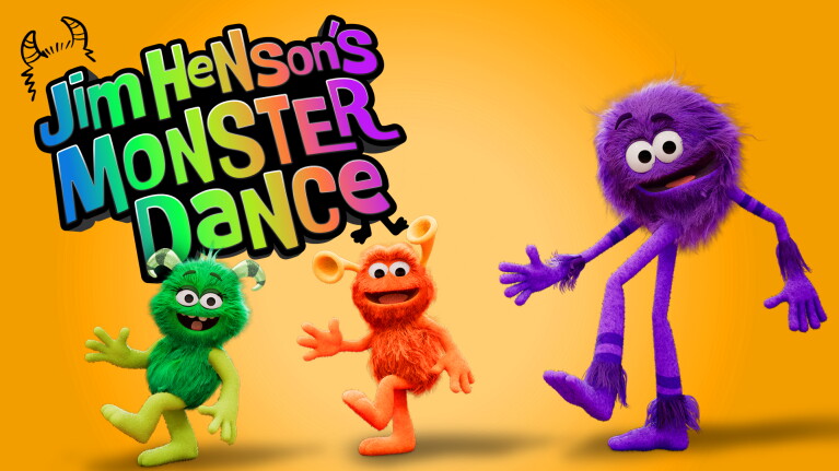 Three furry monsters in green, orange, and purple dancing energetically with text reading Jim Henson's Monster Dance
