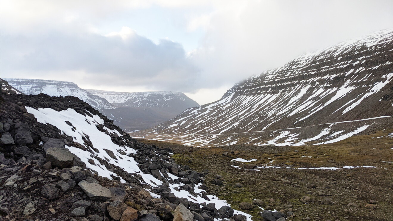 A picture of mountains covered with Snow in Iceland.