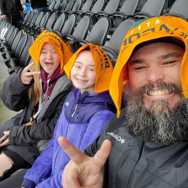 A supporter of the body positive movement smiles for a photo.