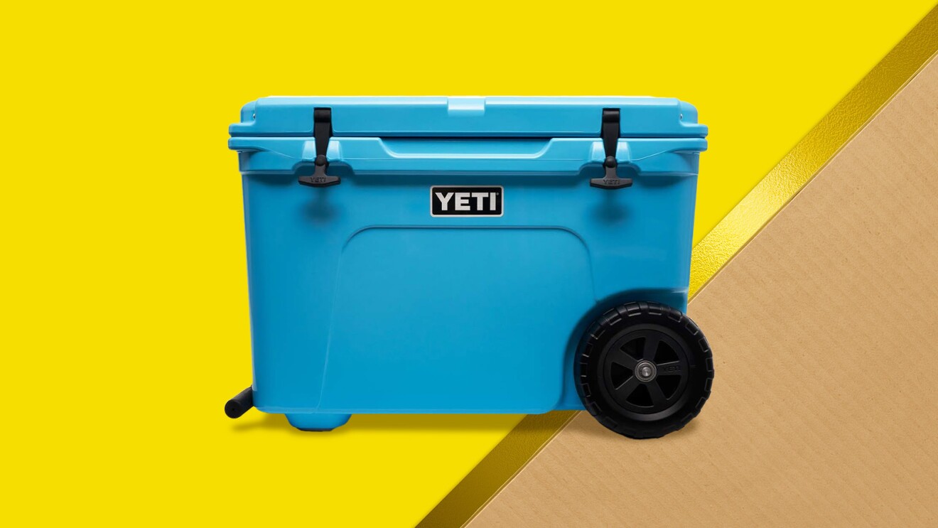 Blue Yeti cooler on wheels against yellow background