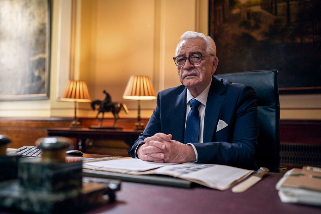Brian Cox in elegant office with warm lighting and classic decor for 007: Road To A Million season 2