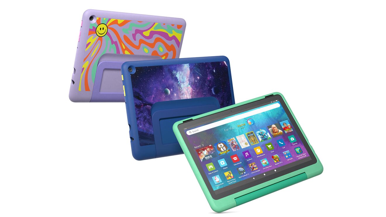 Amazon Fire tablets for children in purple, blue, and green protective cases