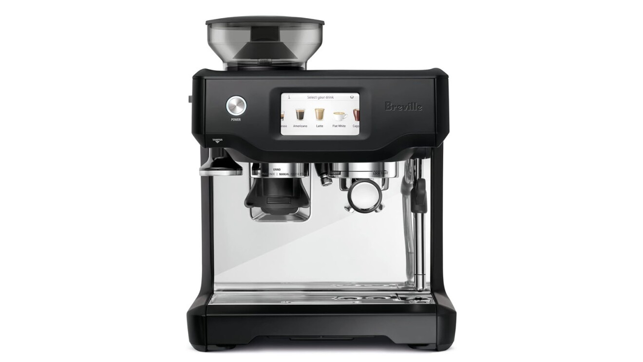 An image of an at-home espresso machine from Breville. It is silver with black accents.