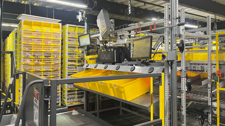 An image of the Pick station inside an Amazon fulfillment center.