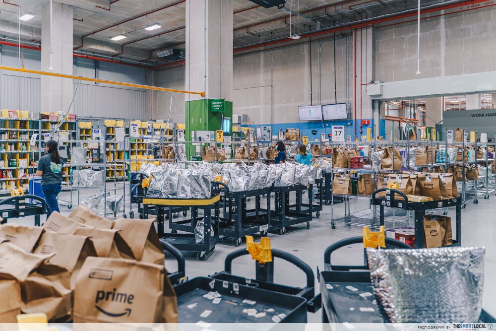 The Magic Library at the Amazon Fresh fulfillment centre filled with packages ready for pick up by delivery drivers