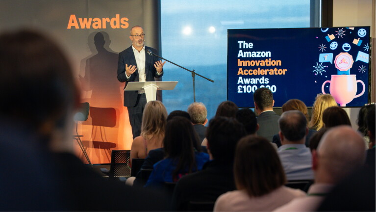 Speaker presenting at Amazon Innovation Accelerator Awards event