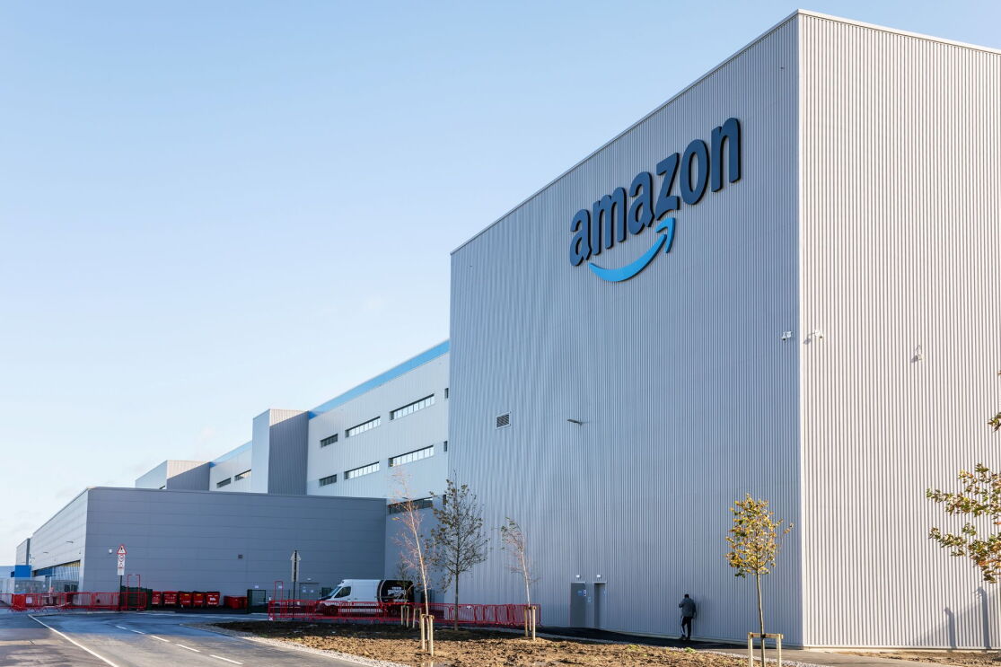 Large Amazon warehouse facility in Swindon (BRS2) with blue logo on white exterior