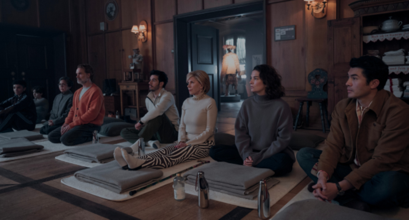 Menschen sitzen im Retreat 