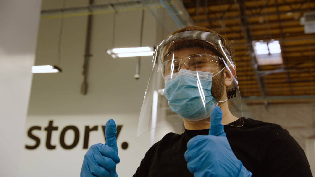 Volunteers work together to use technology to make PPE for medical professionals during the COVID-19 pandemic