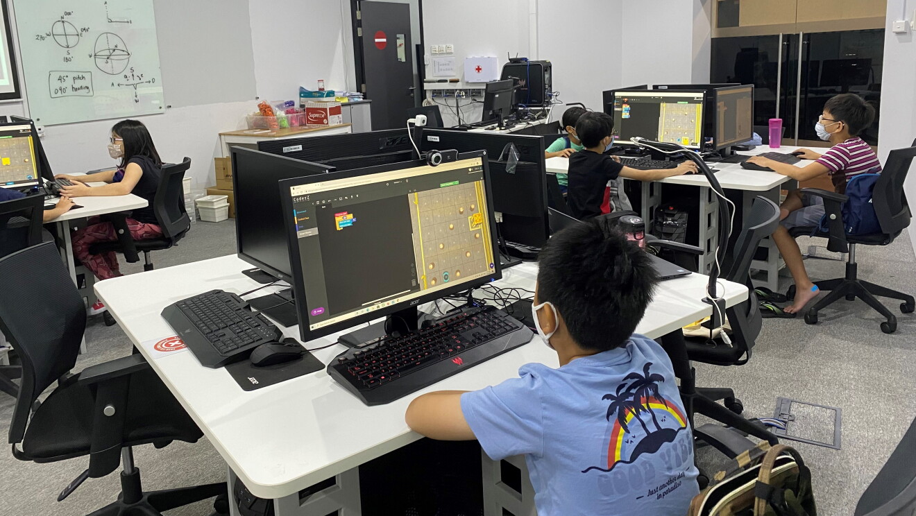 Children taking part in a primary school workshop at Science Centre Singapore