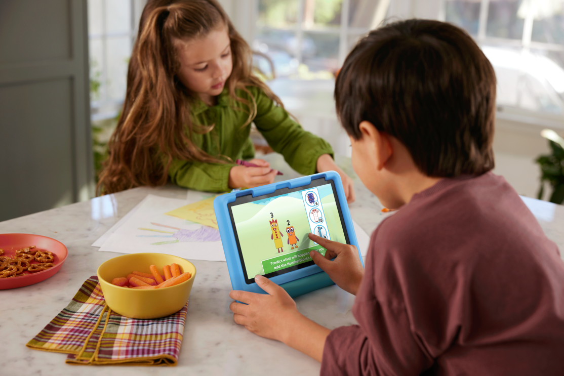 A child playing with the Amazon Fire HD 8 Kids Pro