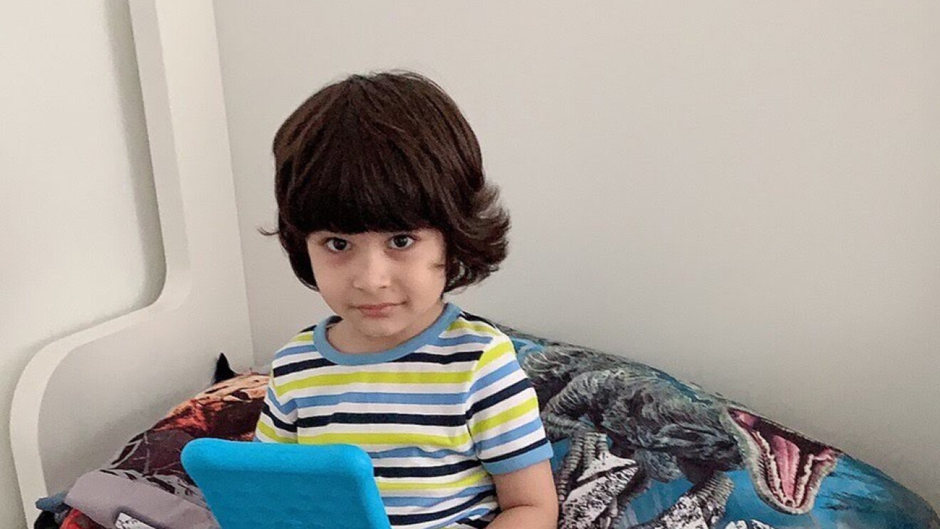 A person received a Kindle device from Amazon.