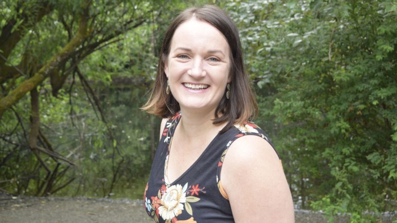 A photo of JoAnna Hunt, Principal Project Manager leading the Kindle Accessibility Team and Director of A11yCon.
