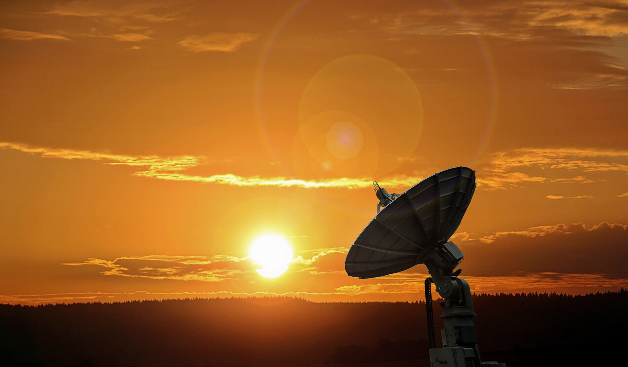 Amazon Web Services satellite shown in natural, outdoor environment.