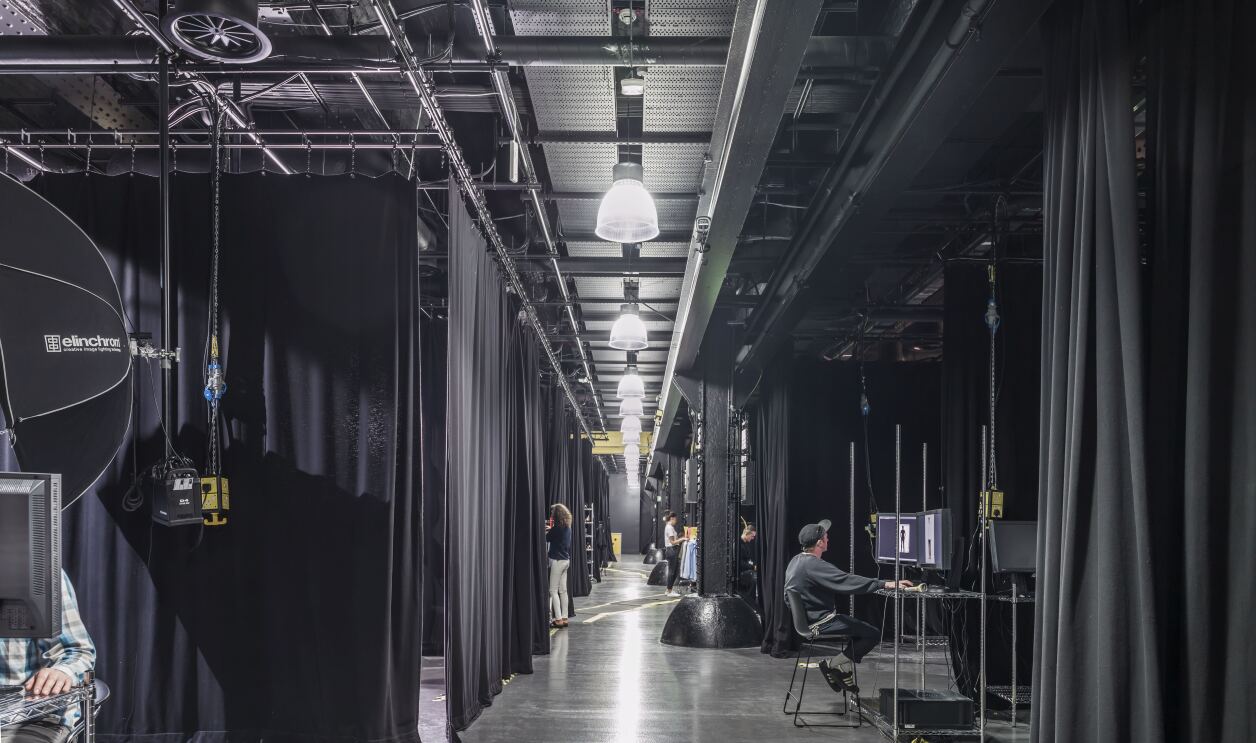A corridor crossing the photo bays inside Amazon's Fashion Studio in London